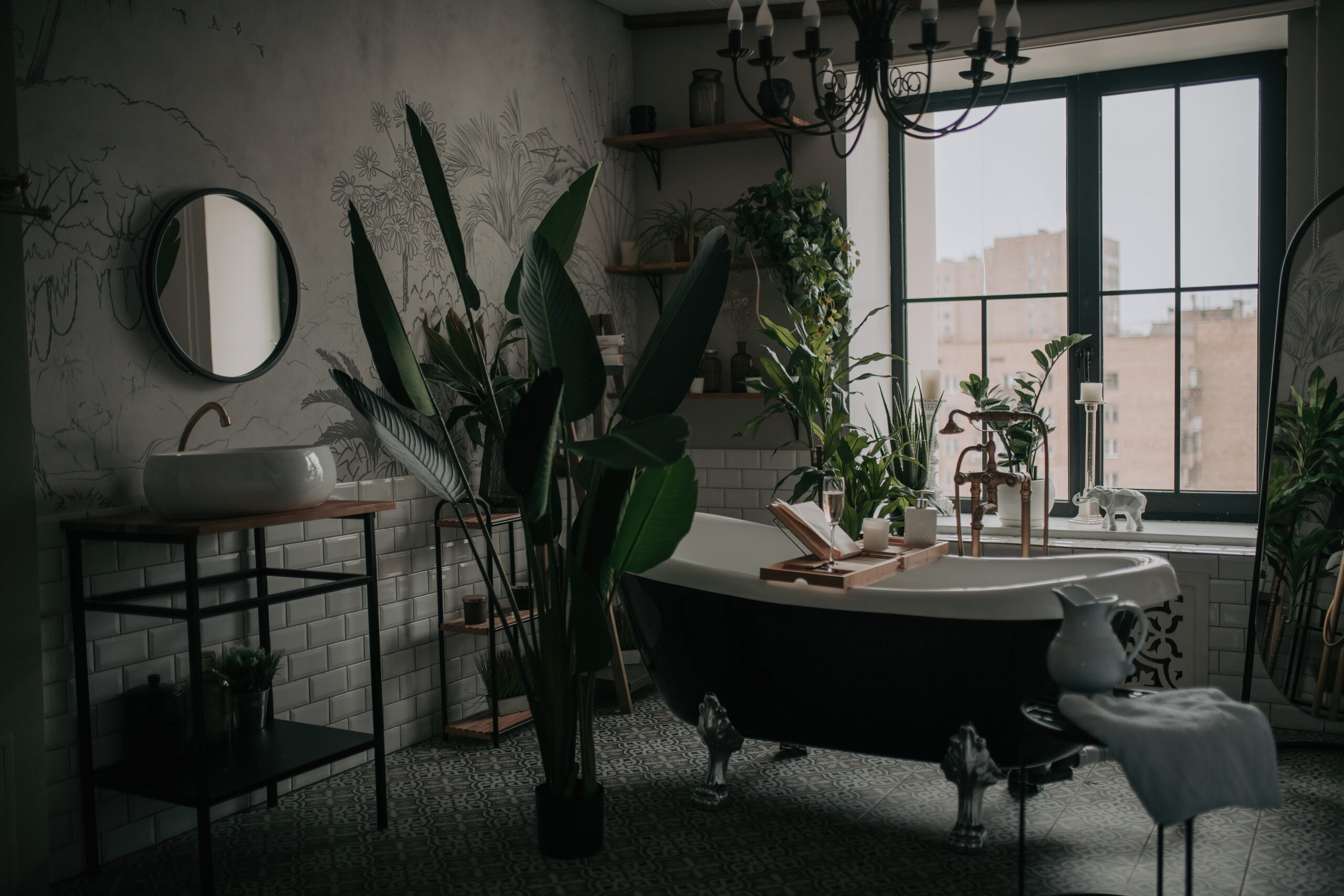 Luxury interior of eco style modern bathroom with oval bathtub and accessories at natural lighting