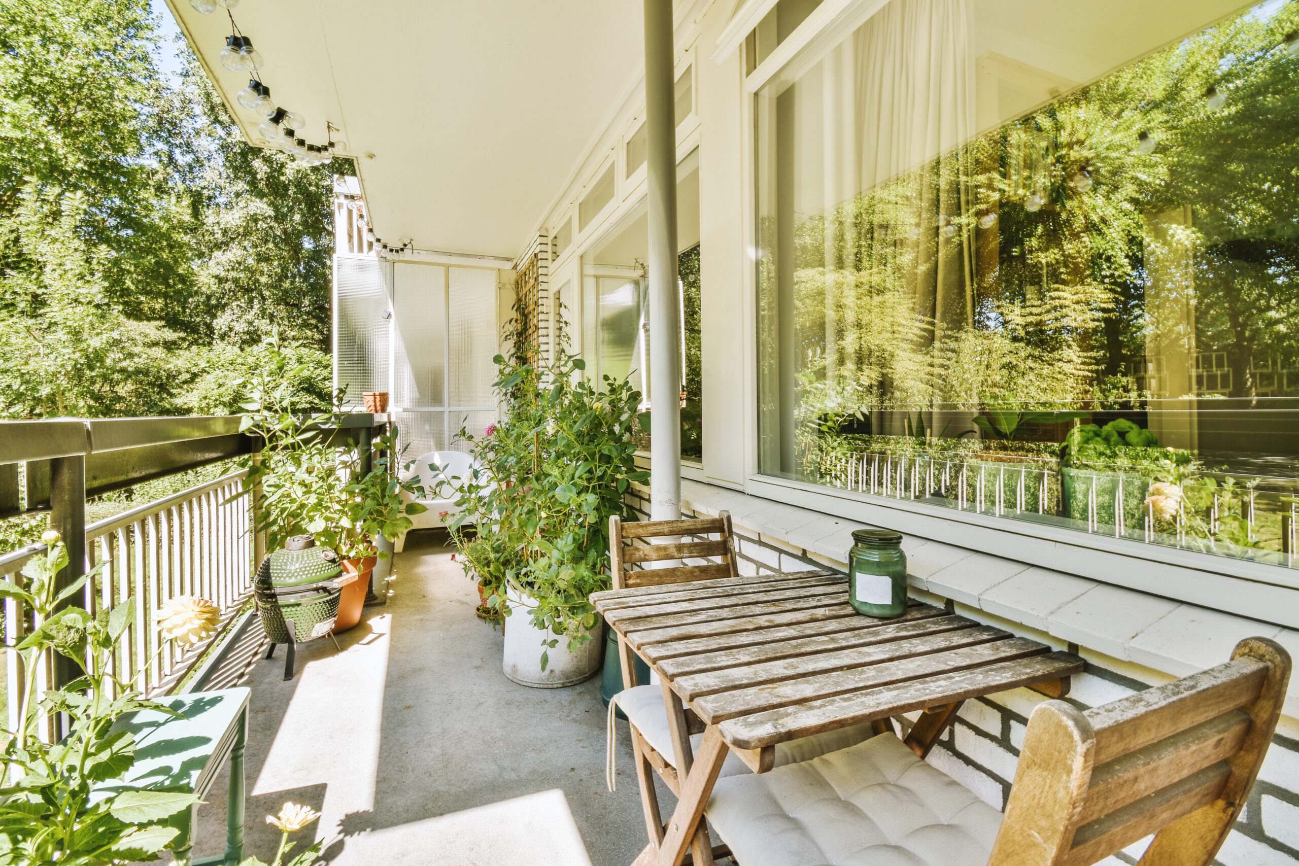 Narrow balcony with chair and door